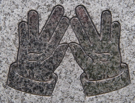 The Kohanim blessing: a symbol showing two hands arranged for the Priestly Blessing
